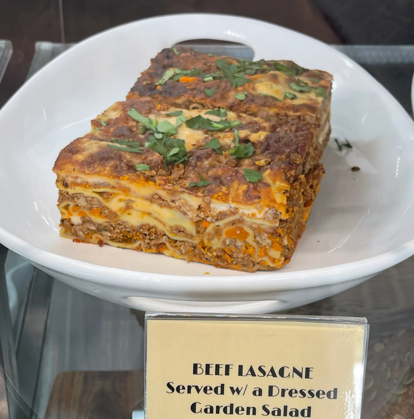 Beef lasagne on a white plate